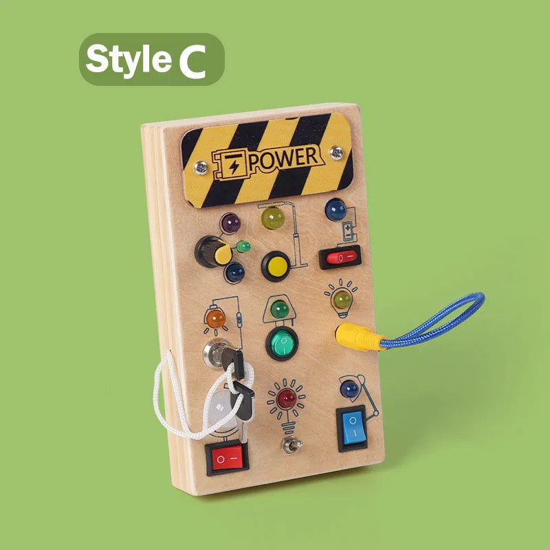 Educational wooden busy board with interactive switches and latches